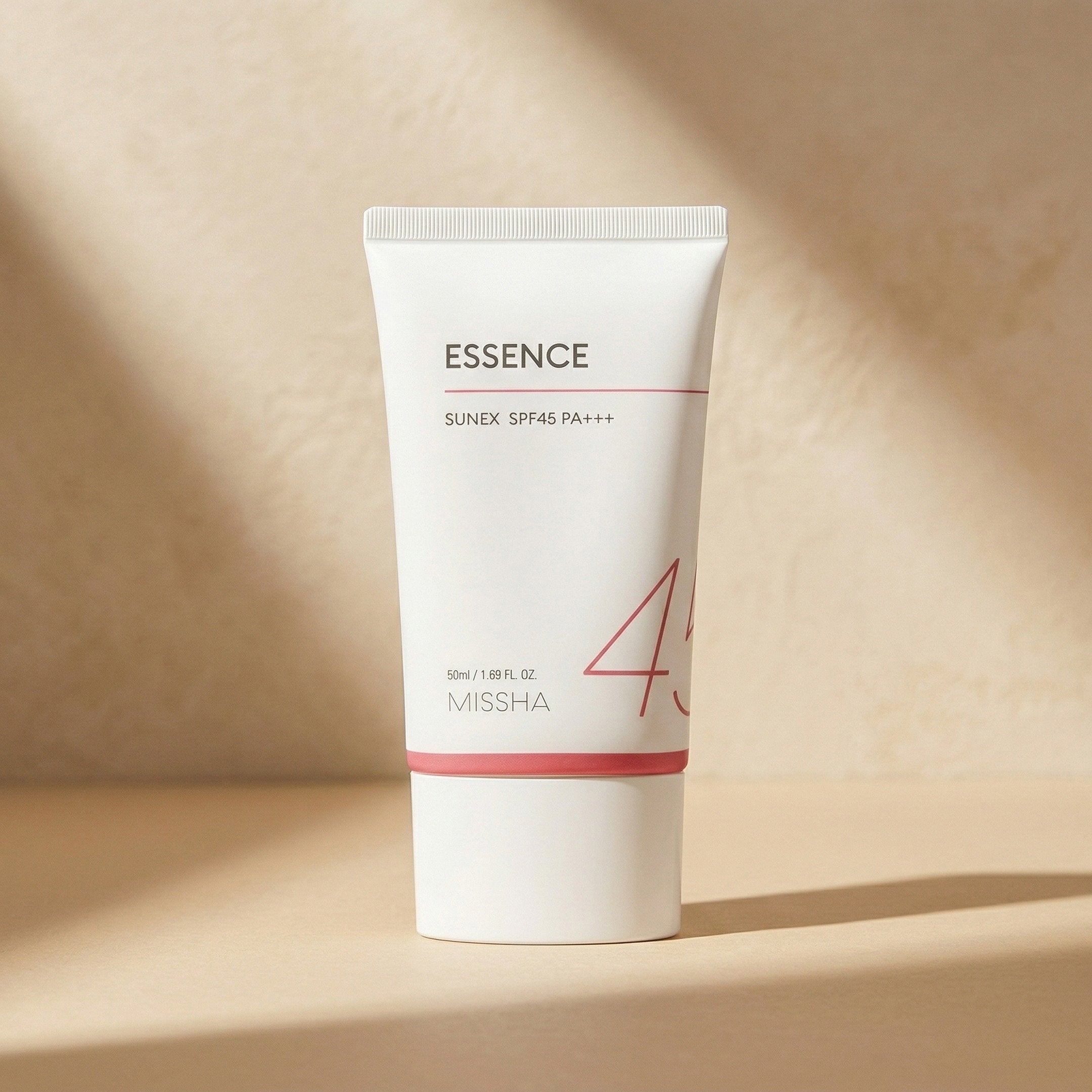 Missha — All Around Safe Block Essence Sun SPF45 PA+++ 50ml — editorial — fundo bege