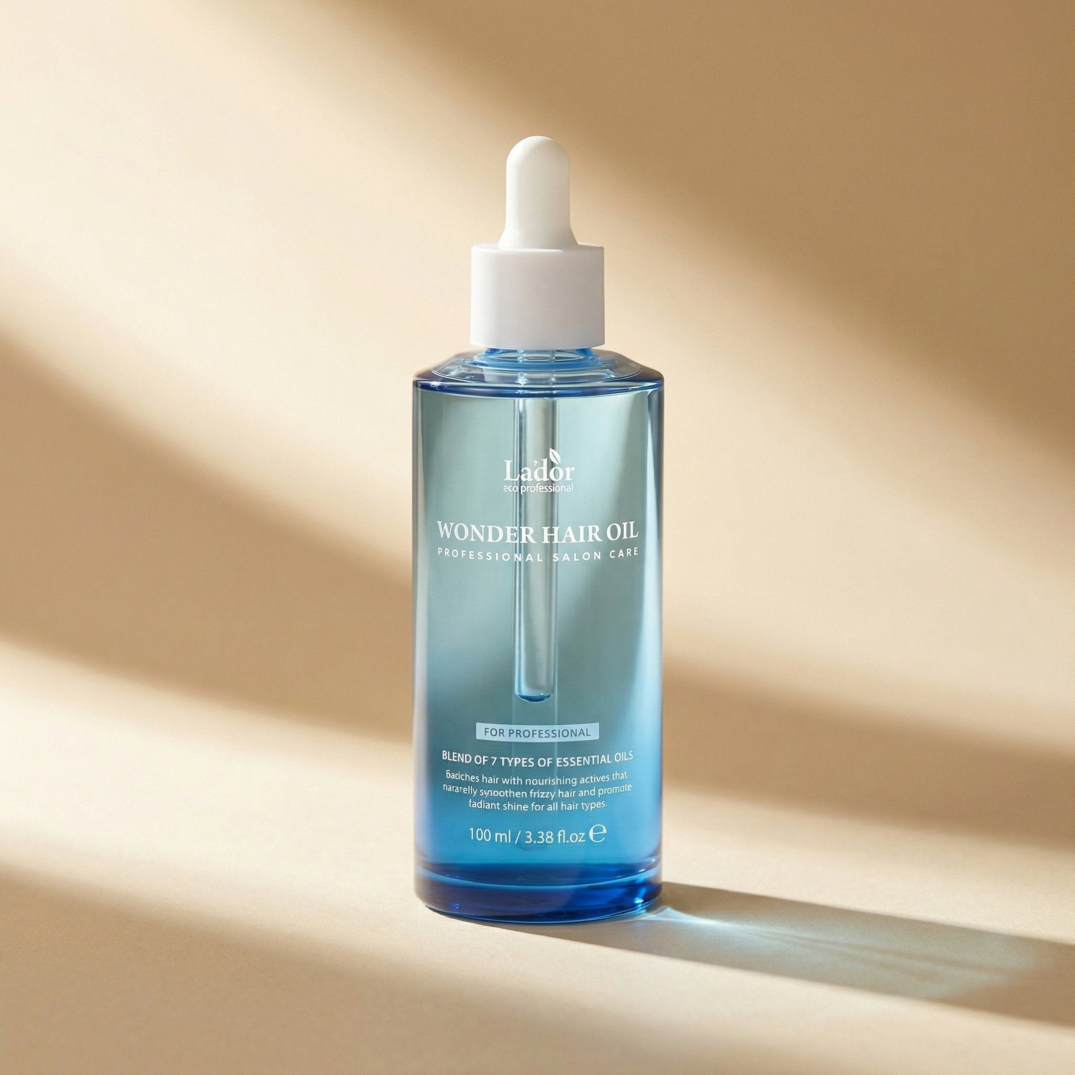 Lador — Wonder Hair Oil 100ml — editorial — fundo bege