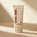 K-Secret — SEOUL 1988 Sun : Pine Tree + Ceramide SPF50+ PA++++ 50ml — editorial — fundo bege
